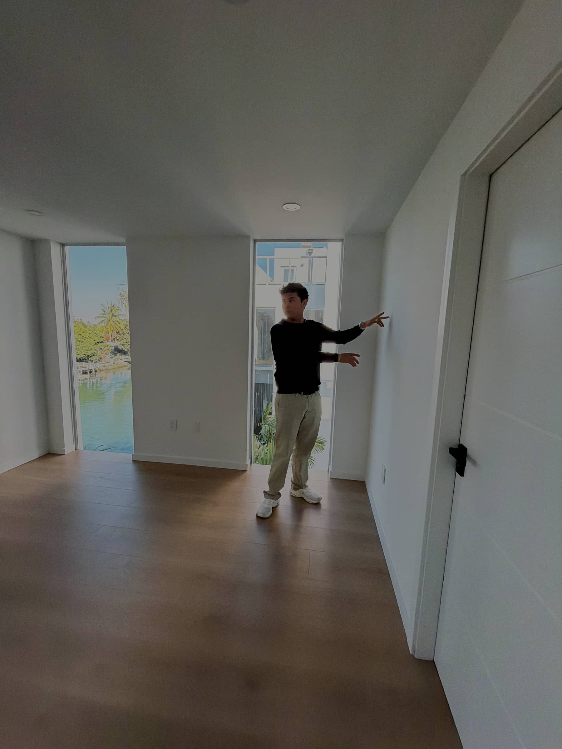 Jeffrey Escobar planning a House AI designed room with canal views in Miami Beach, Florida, January 2026