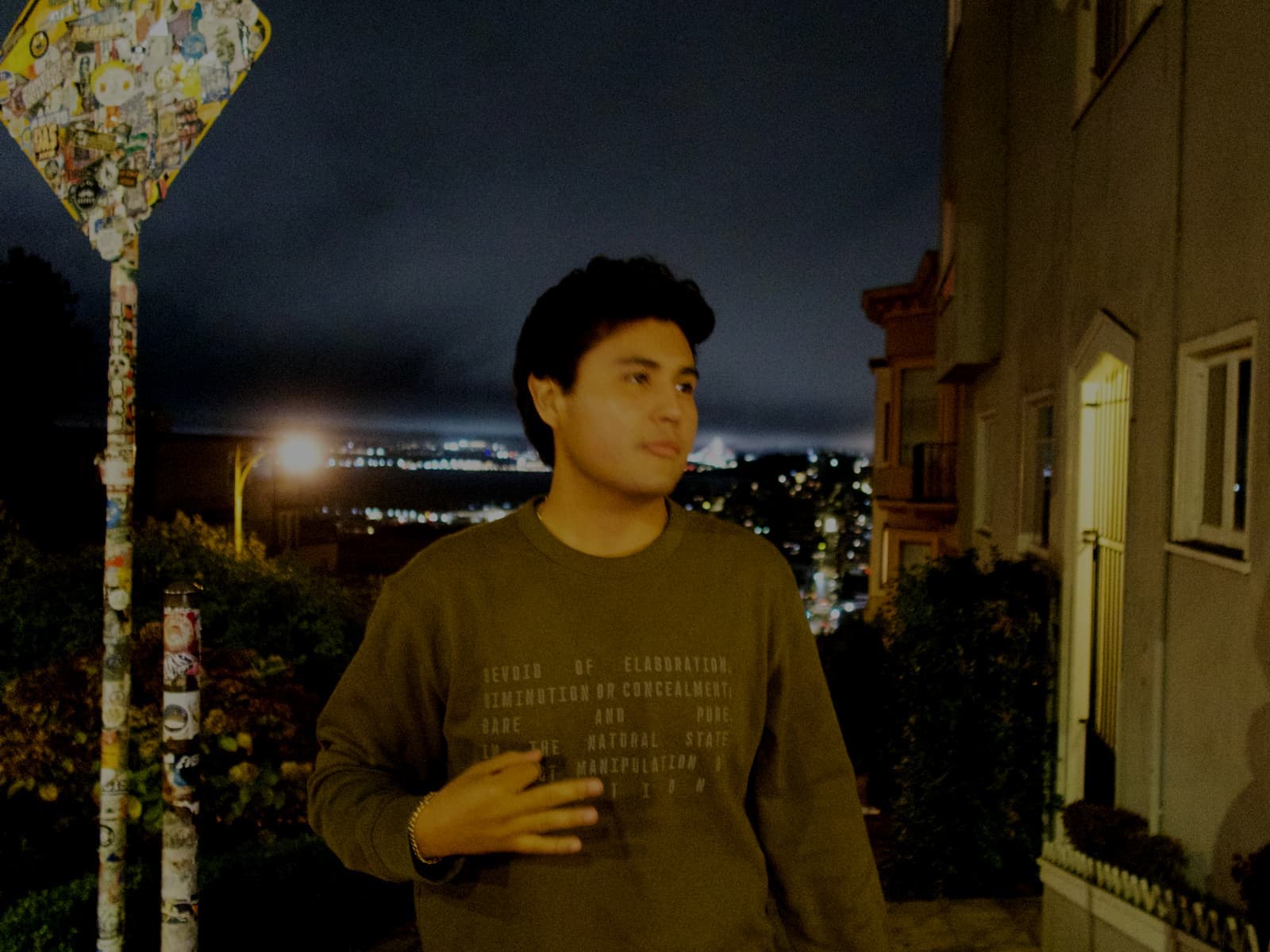 Jeffrey Escobar, Miami-based founder of House AI, in San Francisco at night with city lights behind him