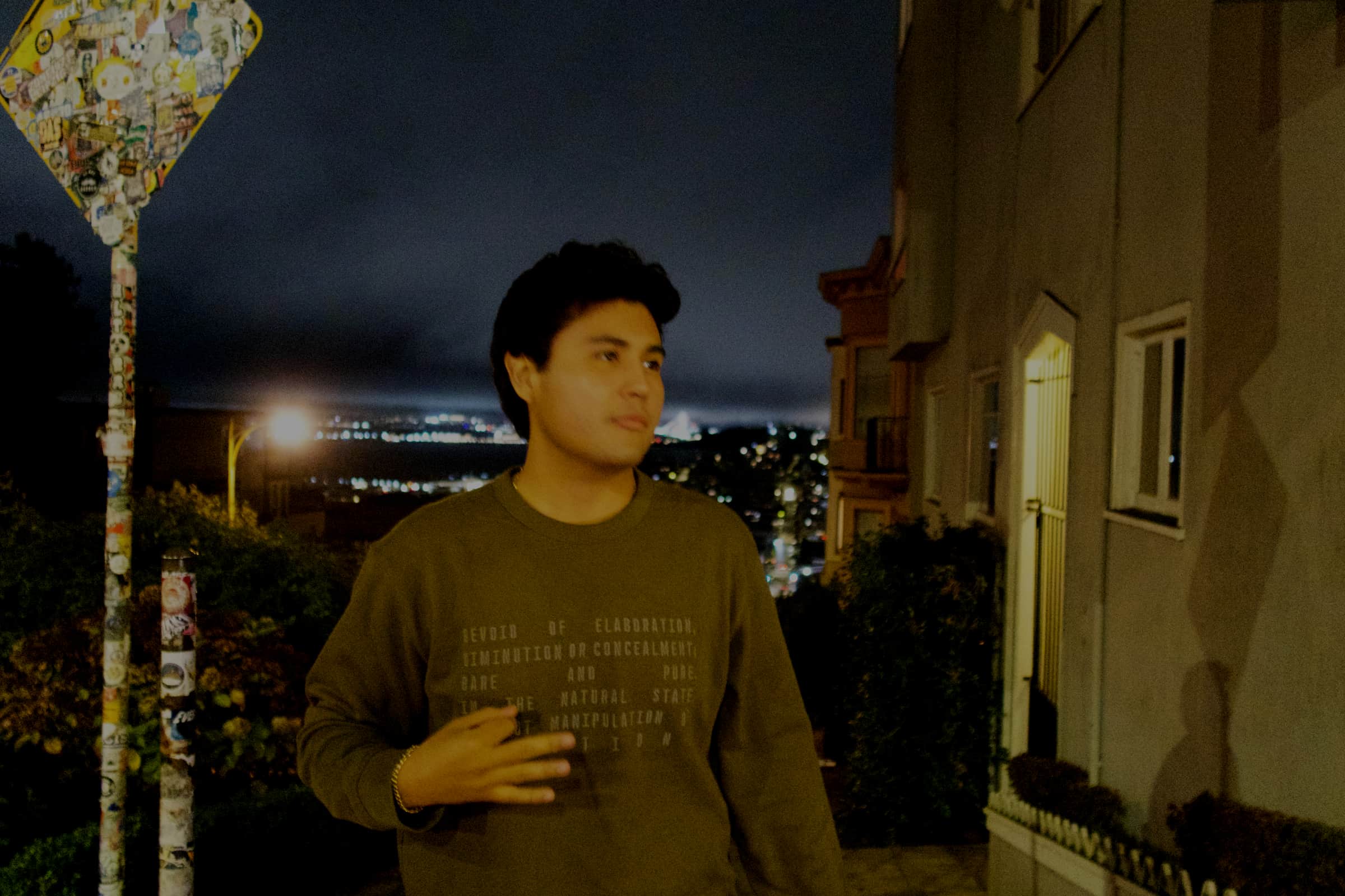 Jeffrey Escobar, Miami-based founder of House AI, in San Francisco at night with city lights behind him