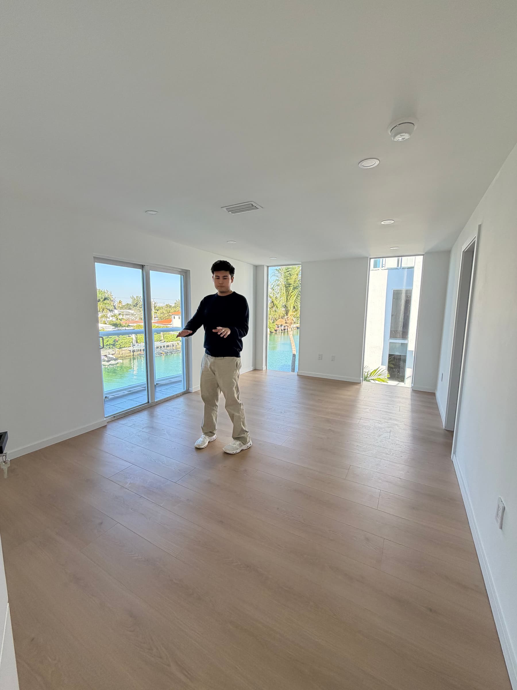 Jeffrey Escobar coordinating the House AI interior design of a waterfront Miami Beach living room, January 2026