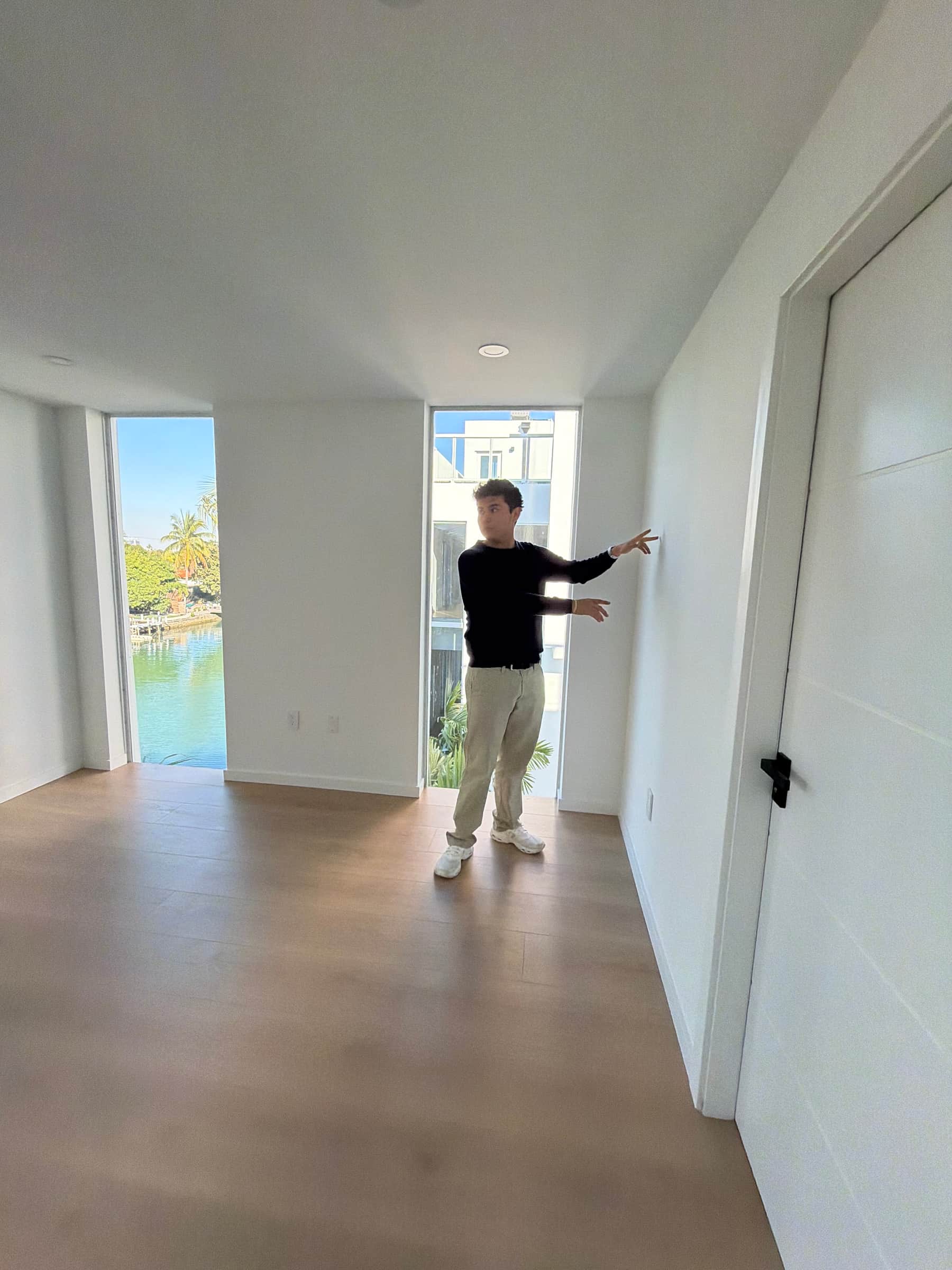 Jeffrey Escobar planning a House AI designed room with canal views in Miami Beach, Florida, January 2026