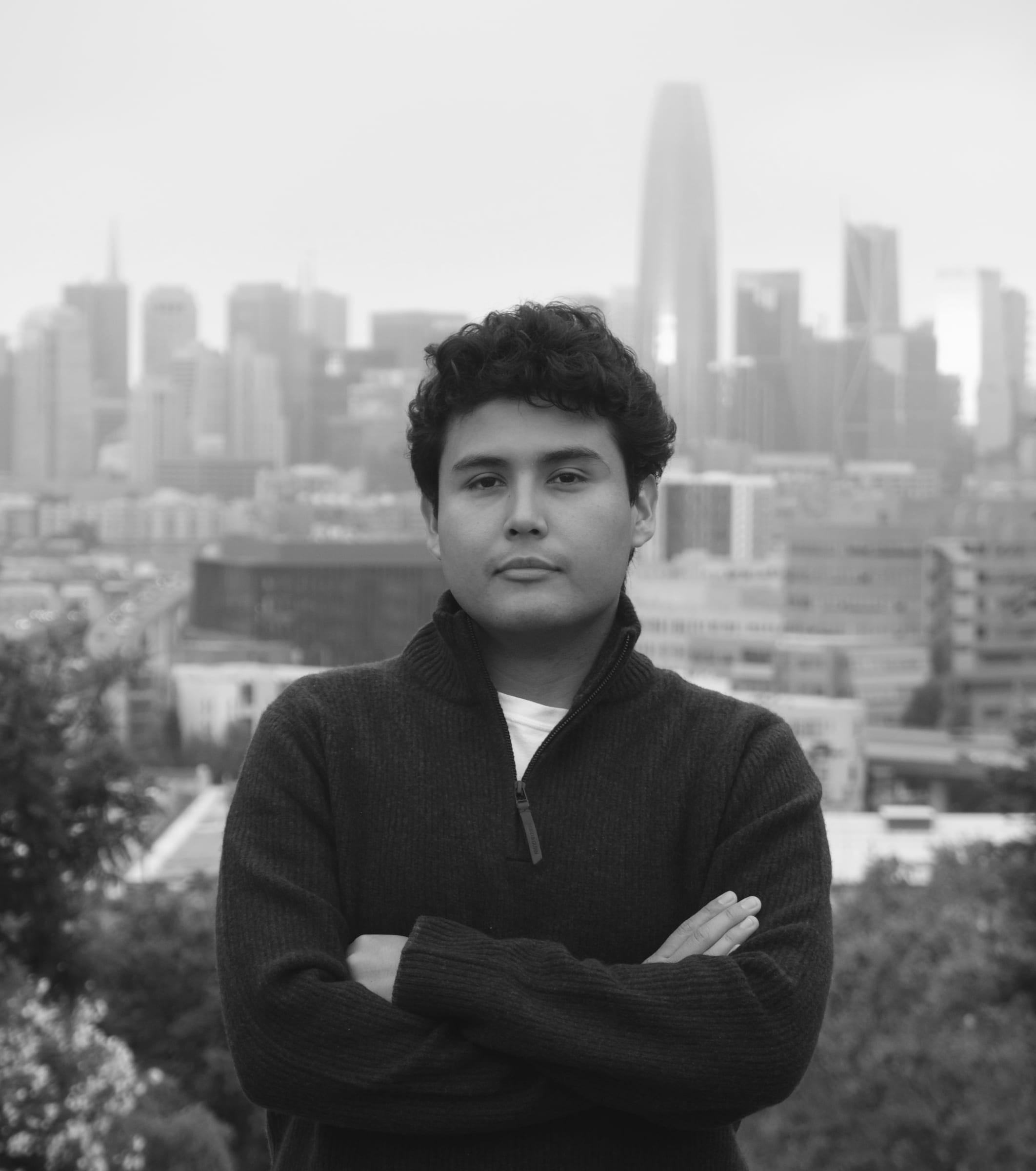 Black and white portrait of Jeffrey Escobar, founder and CTO of House AI, with the San Francisco skyline behind him